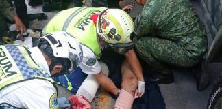 39 lesionados deja la irrupción de normalistas de Ayotzinapa en el Campo Militar No 1.