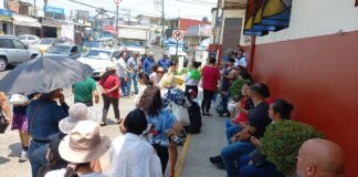 Comerciantes en Las Trancas protestan por cierre de la calle principal .
