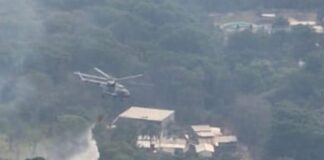 Dice PC que atiende incendio de Tlilalpan con dos helicópteros