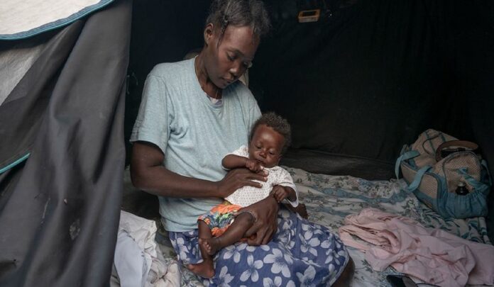 Ocha -Giles Clarke Madre y bebe en Haiti